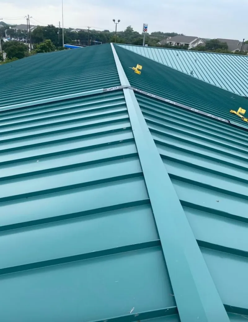 Green commercial metal roof ridge and valley for Metal Roof Repair in Klamath Falls